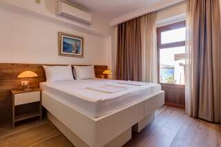 Апартаменты Apartments Langust Свети-Стефан Апартаменты-студио с видом на море-2